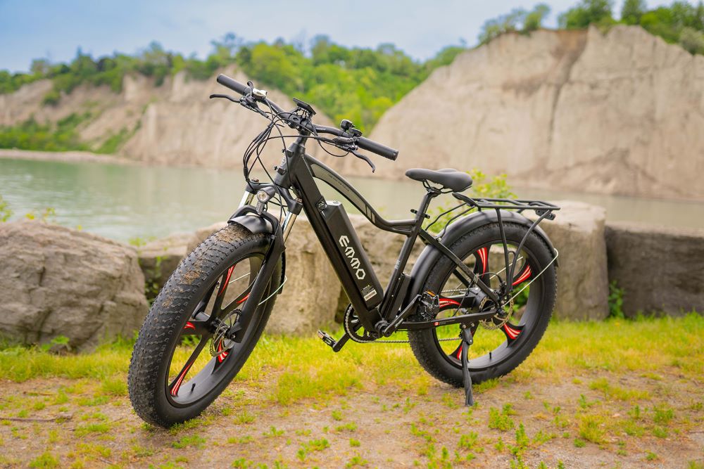 Electric Bike in front of a lush quarry